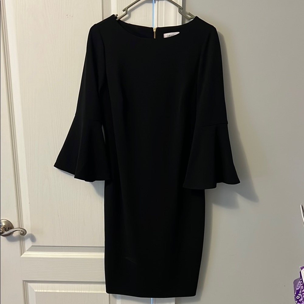 Elegant Black Dress with Flared Sleeves